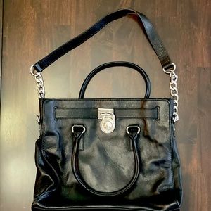 Michael’s Kors purse / bag.  Black exterior.  Very good / like new condition.